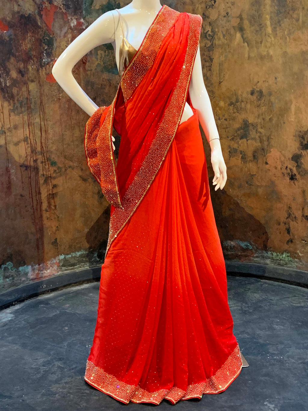 Shaded georgette saree orange red/Embellishment