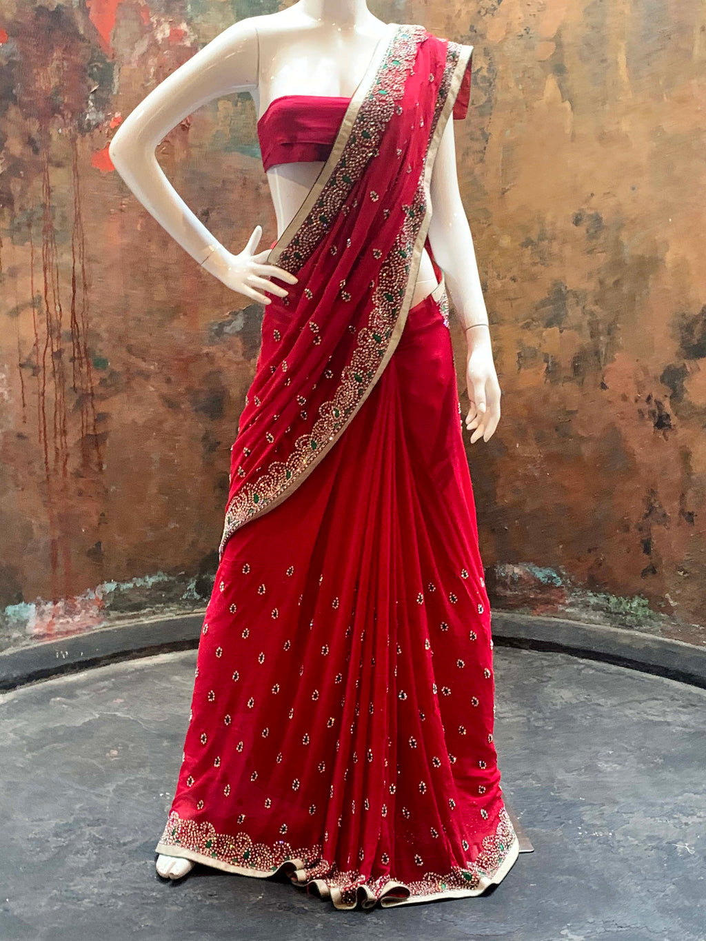 Deep red fully embellished georgette saree
